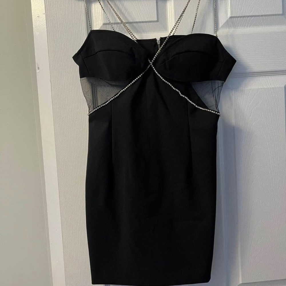 Short black dress worn once! Beautiful sheer on both sides. Diamond straps.